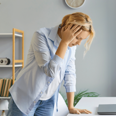 Commonwealth ent | richmond ent | midlothian ent 9 Woman experiencing dizziness, representing treatment for vertigo and balance disorders